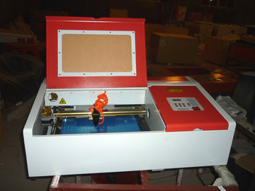 ประเทศจีน Desktop Laser Engraver Co2 Laser Engraving And Cutting Machine For Carving Chapter And Artistic Works ผู้ผลิต